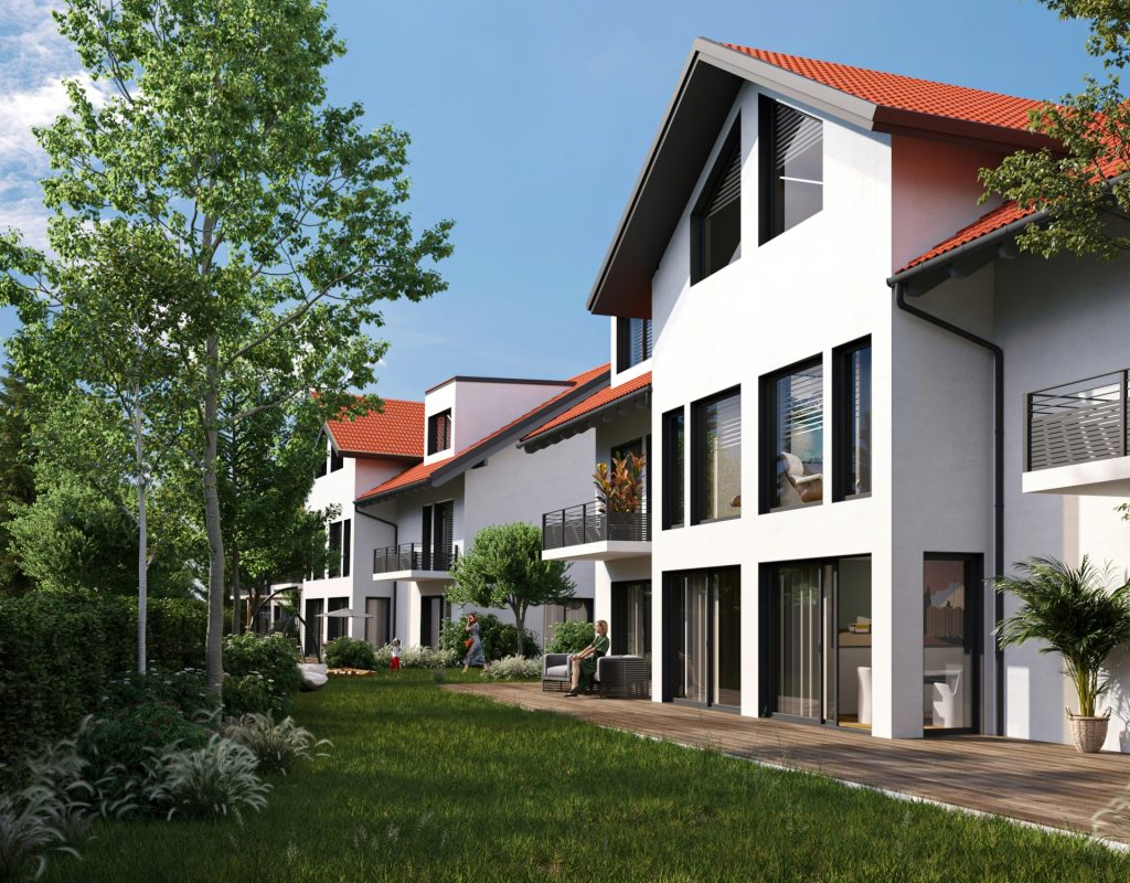 eine Reihe weißer Häuser mit rotem Dach